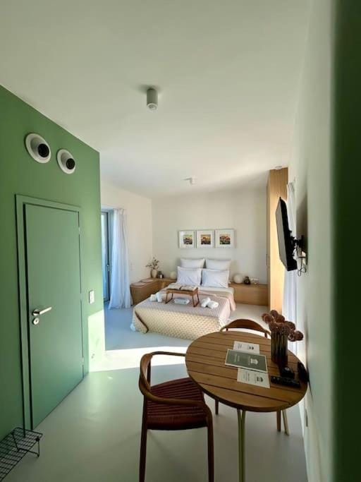 Bed, TV and multimedia, Living room, Seating area, Bedroom, hair dresser, wardrobe