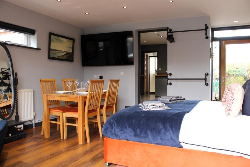 Bed, Living room, Dining area