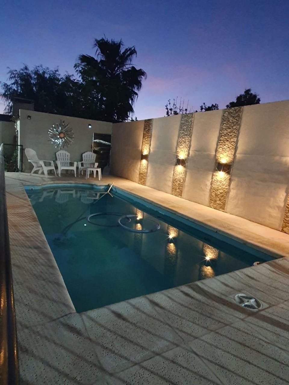Patio, Night, Swimming pool, sunbed