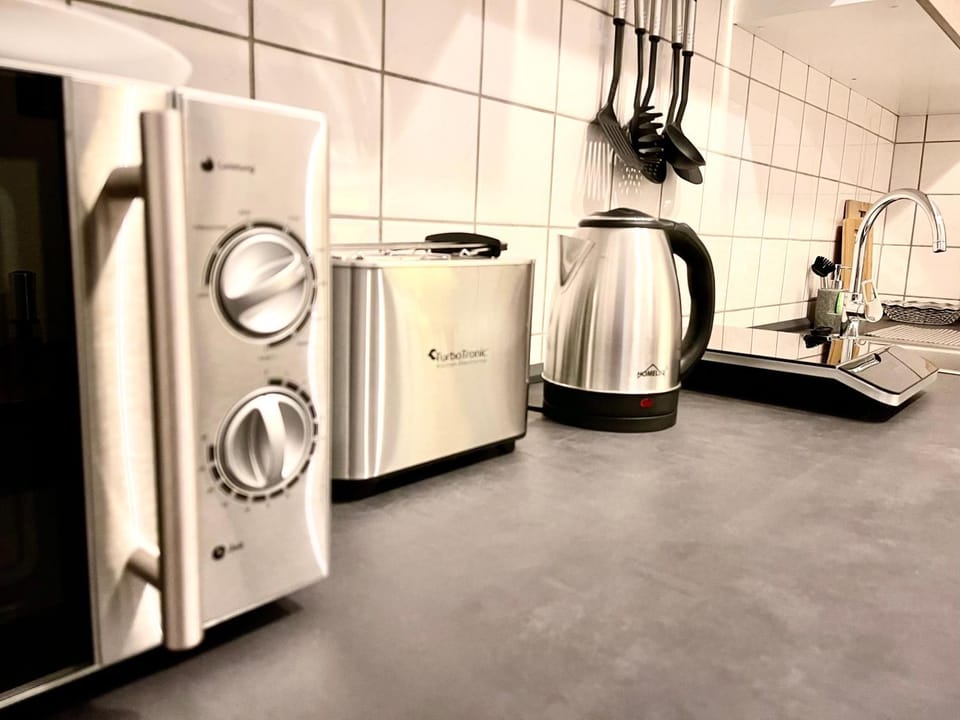 Coffee/tea facilities, Kitchen or kitchenette, minibar, stove, toaster