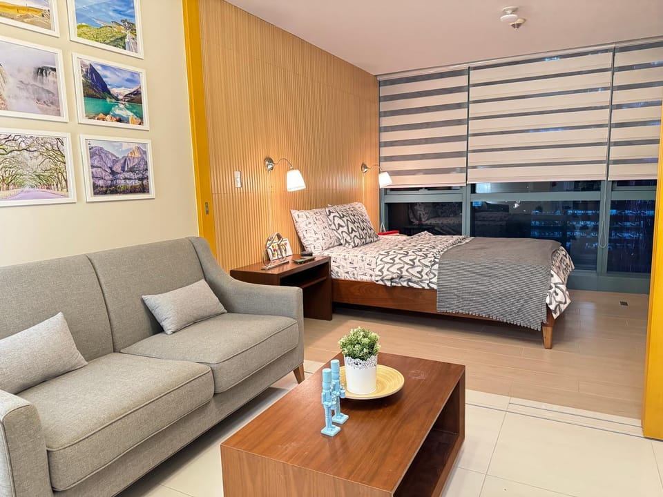 Bed, Living room, Seating area, Bedroom