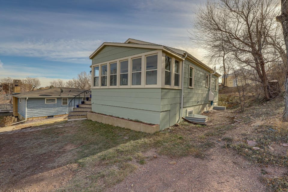 Central Rapid City Home w/ Sunroom & Fireplace! House in Rapid City