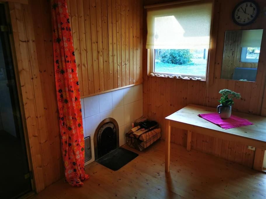 Hide in the nature – cozy lakeside saunacottage House in Estonia