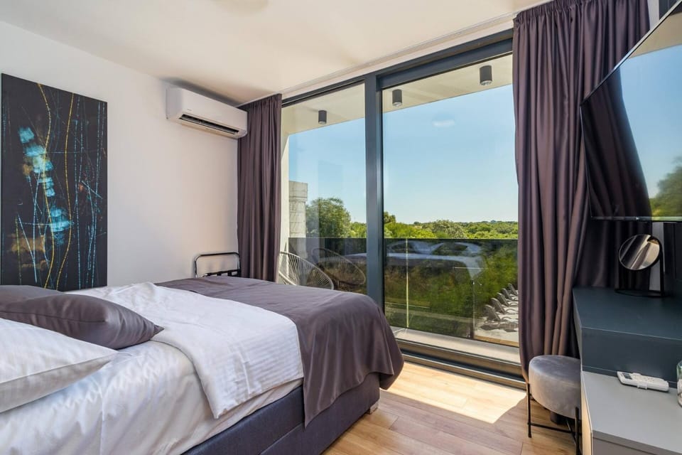 Modern Villa Miaa -32 m2 pool, 4 en-suite bedrooms Villa in Medulin
