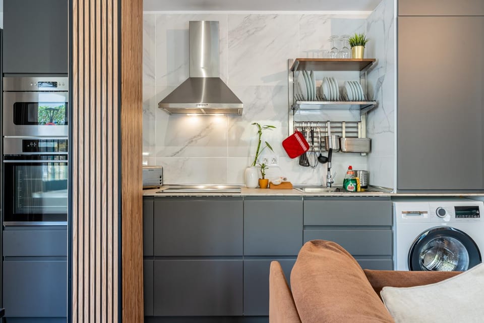 Kitchen or kitchenette, oven, stove, washing machine