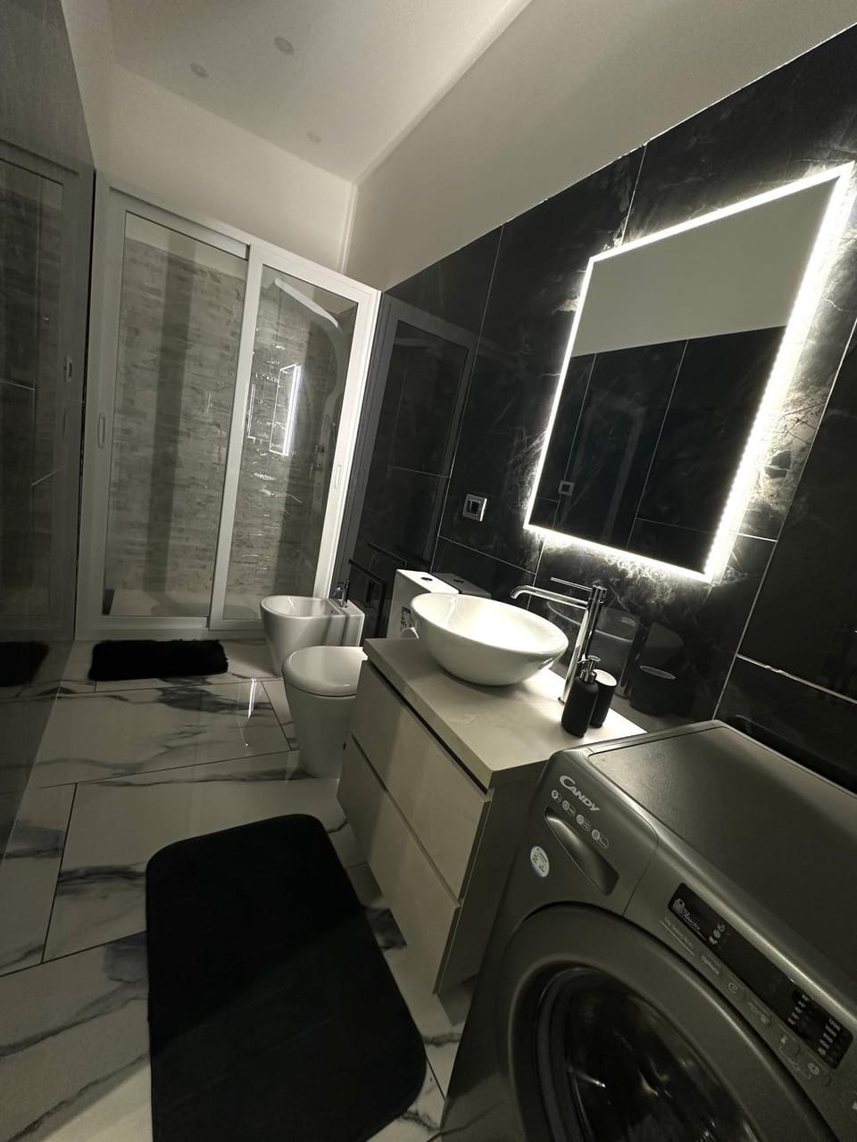Toilet, Bathroom, towels, washing machine