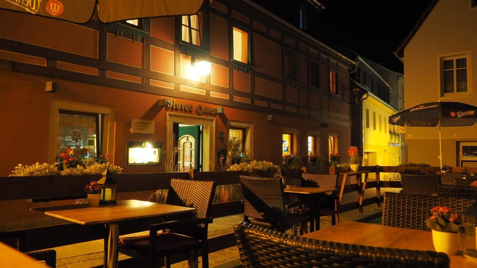 Property building, Restaurant/places to eat, Night, Seating area