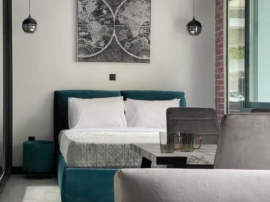 Bed, Living room, Seating area, Bedroom