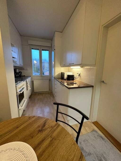 Kotimaailma apartments - Viihtyisä Neliö keskustassa Apartment in Finland