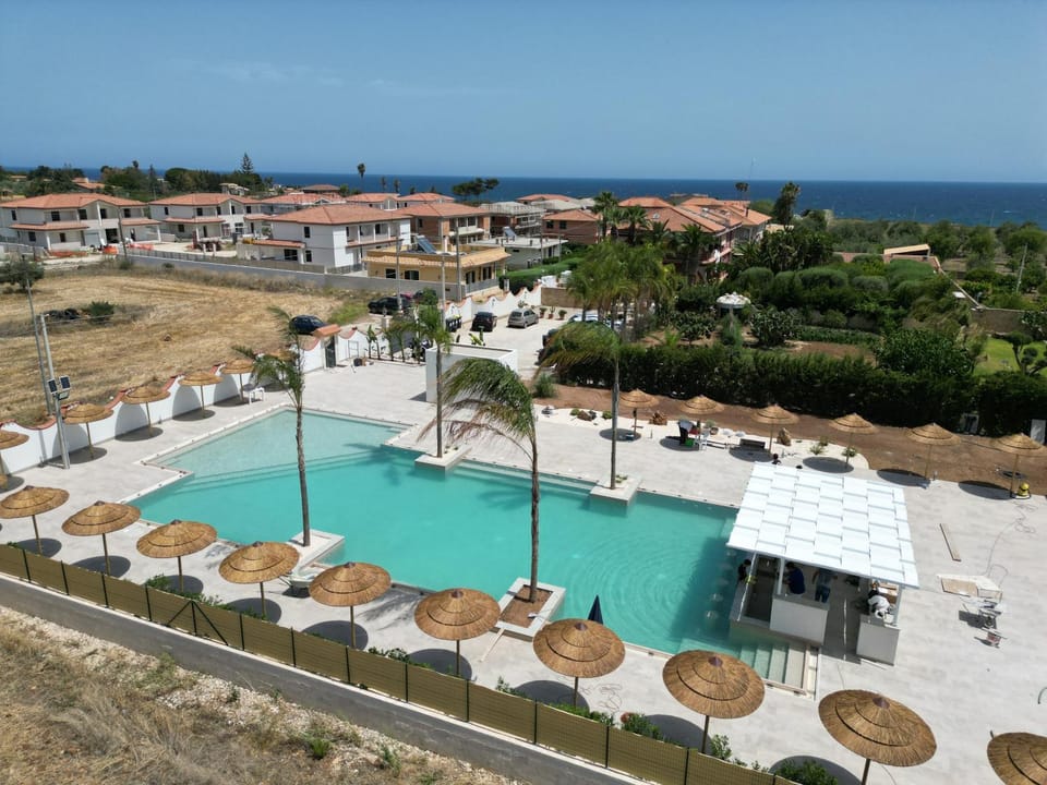 Property building, Pool view, Swimming pool, sunbed