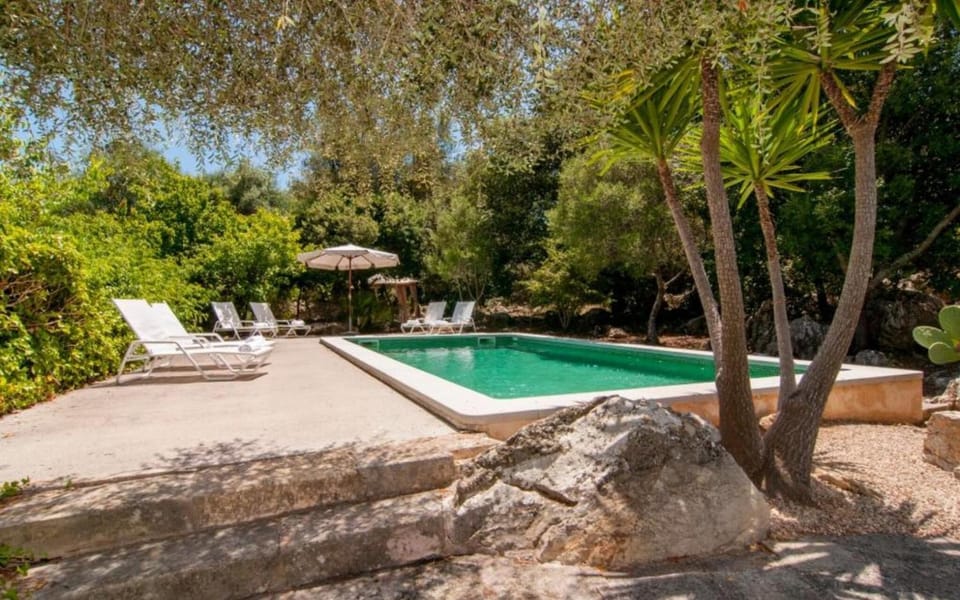 Property building, Living room, Swimming pool