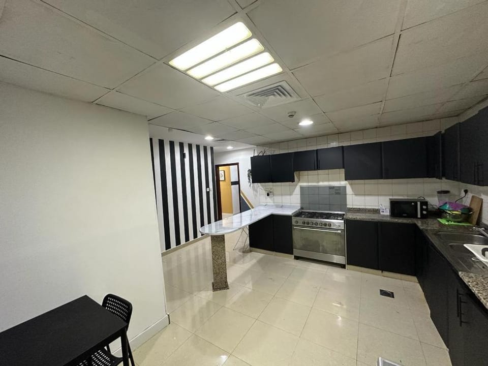 Fancy Partition Room Near Mashreq Metro / SZ Road Vacation rental in Dubai