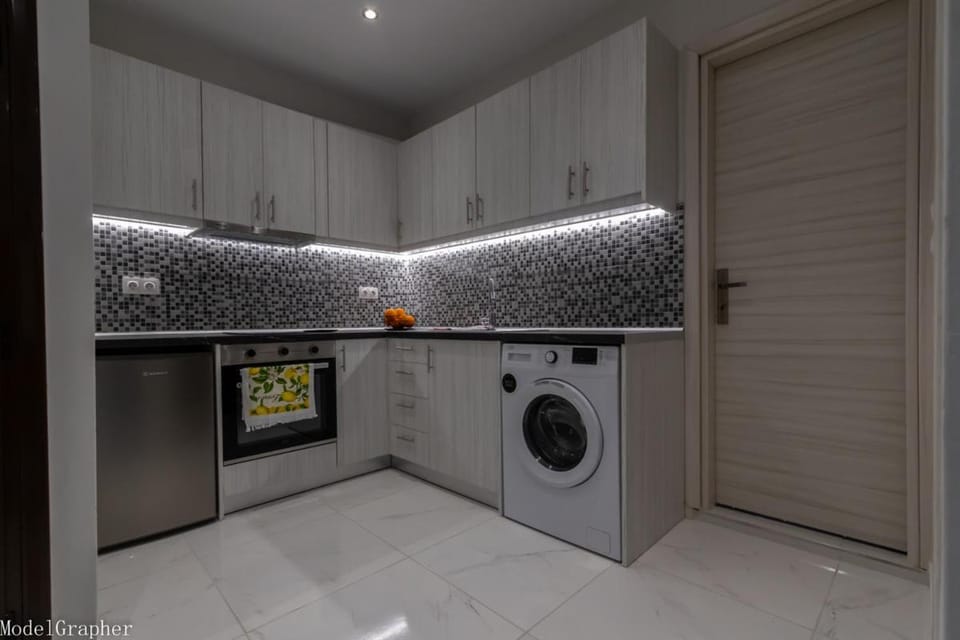 Kitchen or kitchenette, washing machine