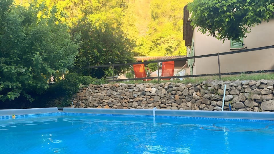 Property building, Living room, Swimming pool
