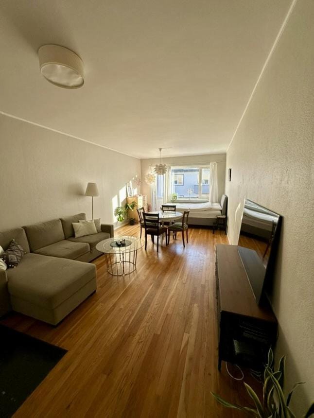 Bed, TV and multimedia, Living room, Seating area, Dining area