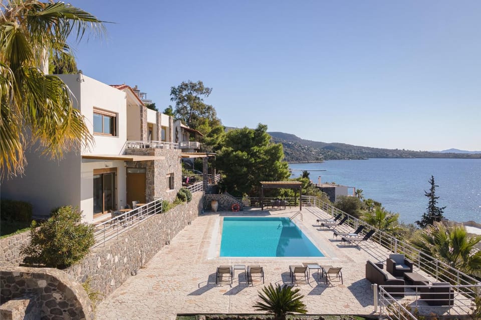 Property building, Patio, Day, Natural landscape, Mountain view, Pool view, Sea view, Swimming pool, sunbed