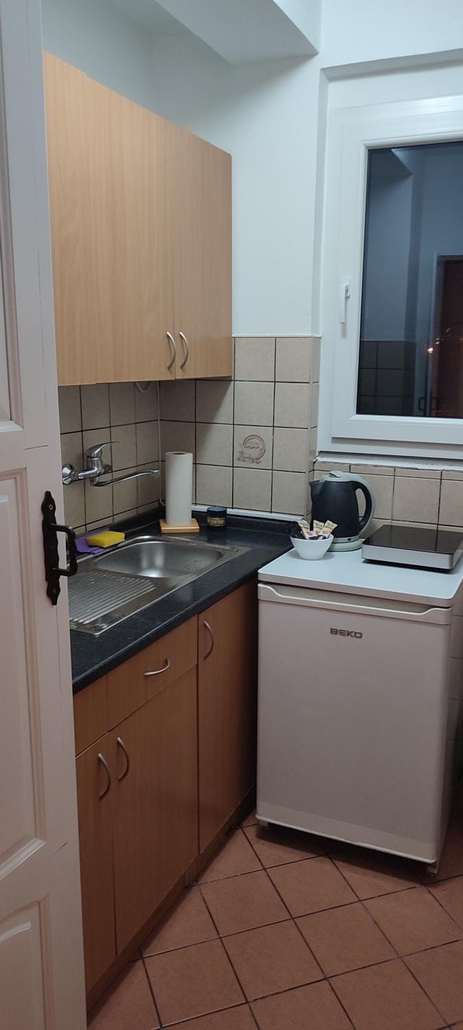 Kitchen or kitchenette, stove