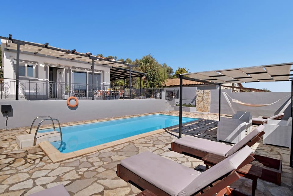 Property building, Living room, Swimming pool