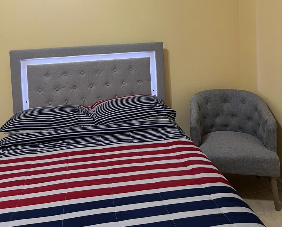 Bed, Seating area, Bedroom
