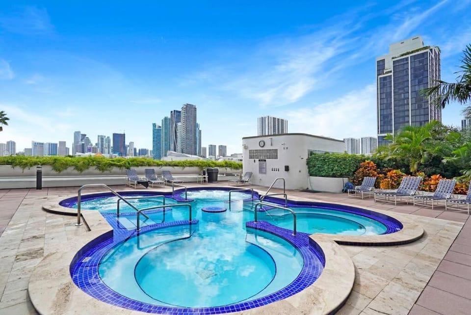 Property building, Hot Tub, City view, sunbed