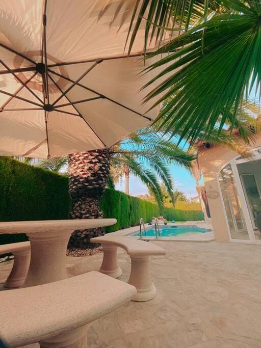 Patio, Day, Garden, Garden view, Pool view, Swimming pool, sunbed