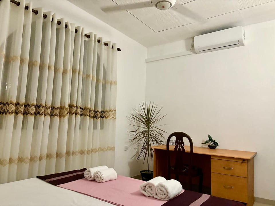 Bed, Photo of the whole room, Bedroom, towels, air conditioner