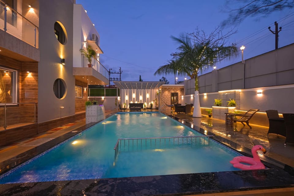 Property building, Night, Pool view, Swimming pool