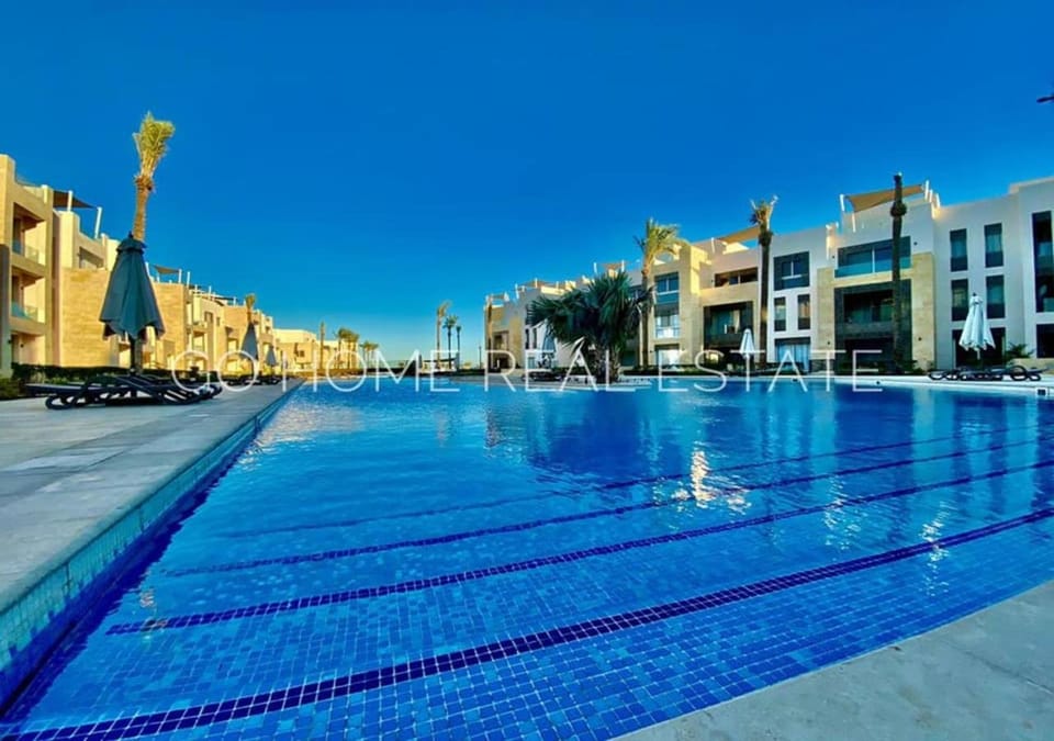 Property building, Pool view, Swimming pool, sunbed