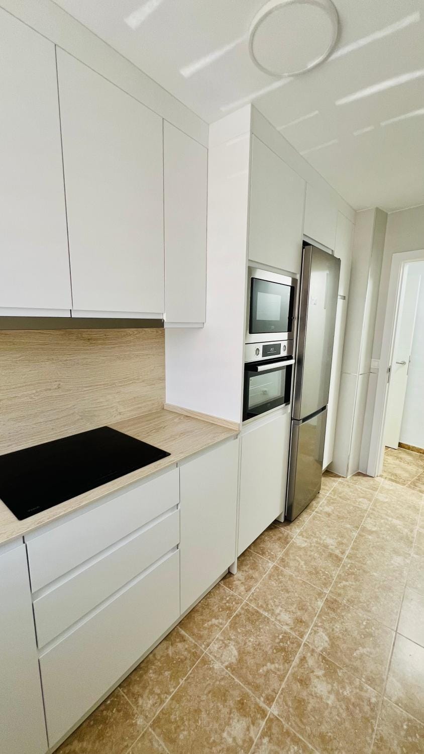 Kitchen or kitchenette, dishwasher, oven, stove, washing machine, kitchen