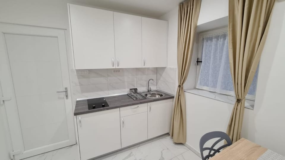 Kitchen or kitchenette, stove