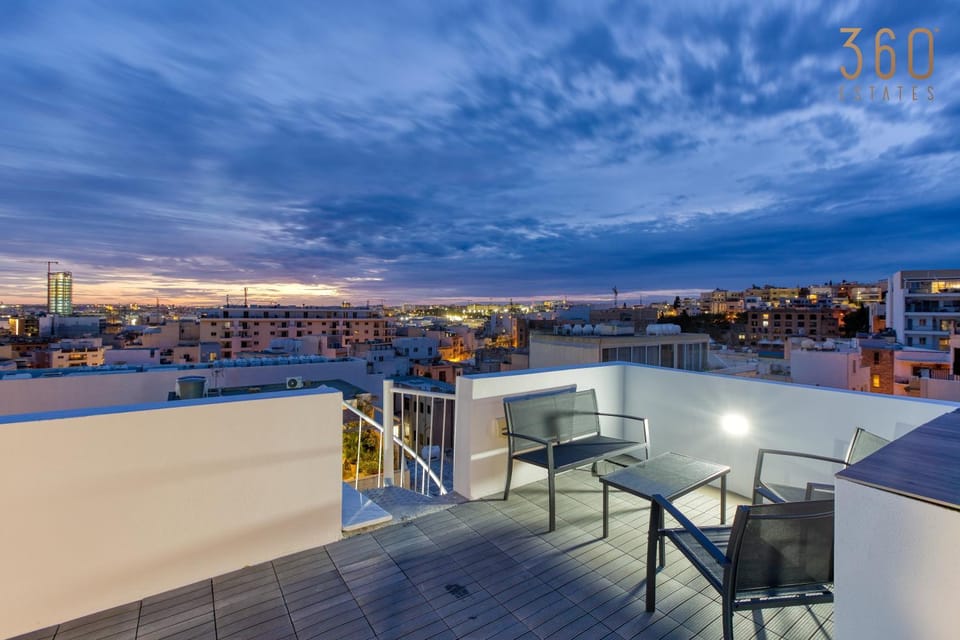 Property building, Patio, Night, View (from property/room), Balcony/Terrace, Living room, Seating area, City view