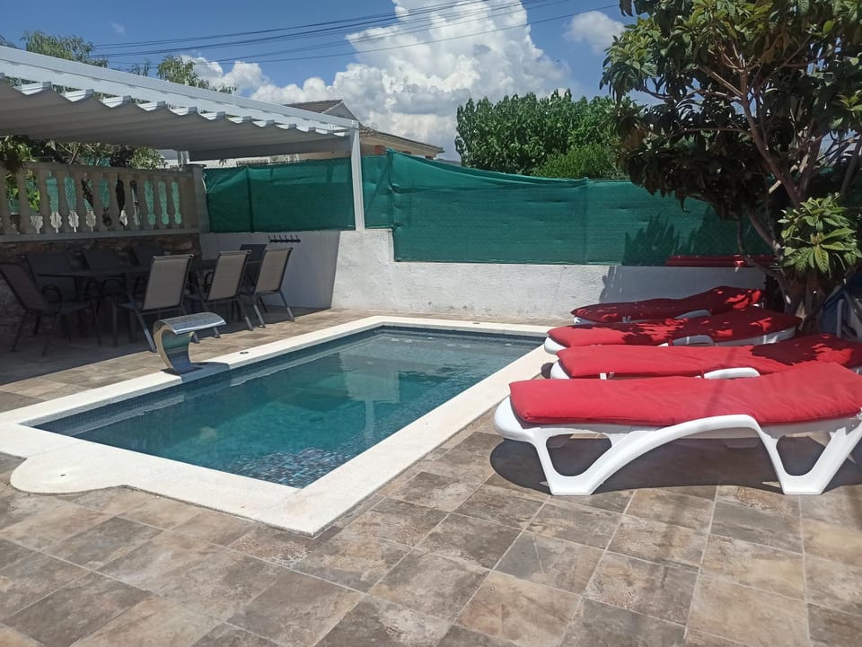 Patio, Day, Solarium, Pool view, Swimming pool, sunbed