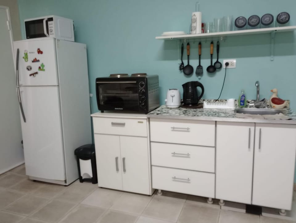 Kitchen or kitchenette, oven, stove