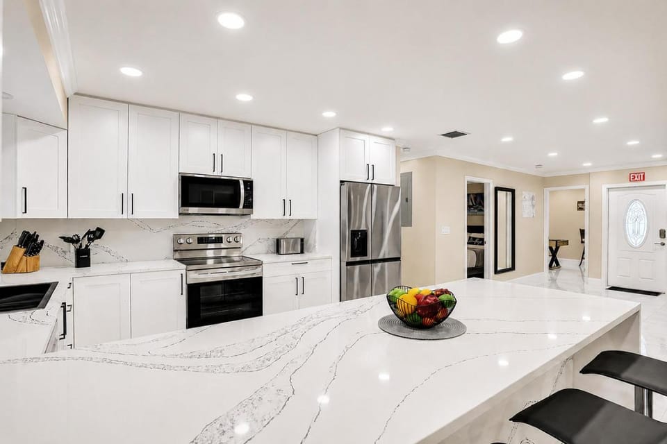 Kitchen or kitchenette, dishwasher, oven, stove, toaster