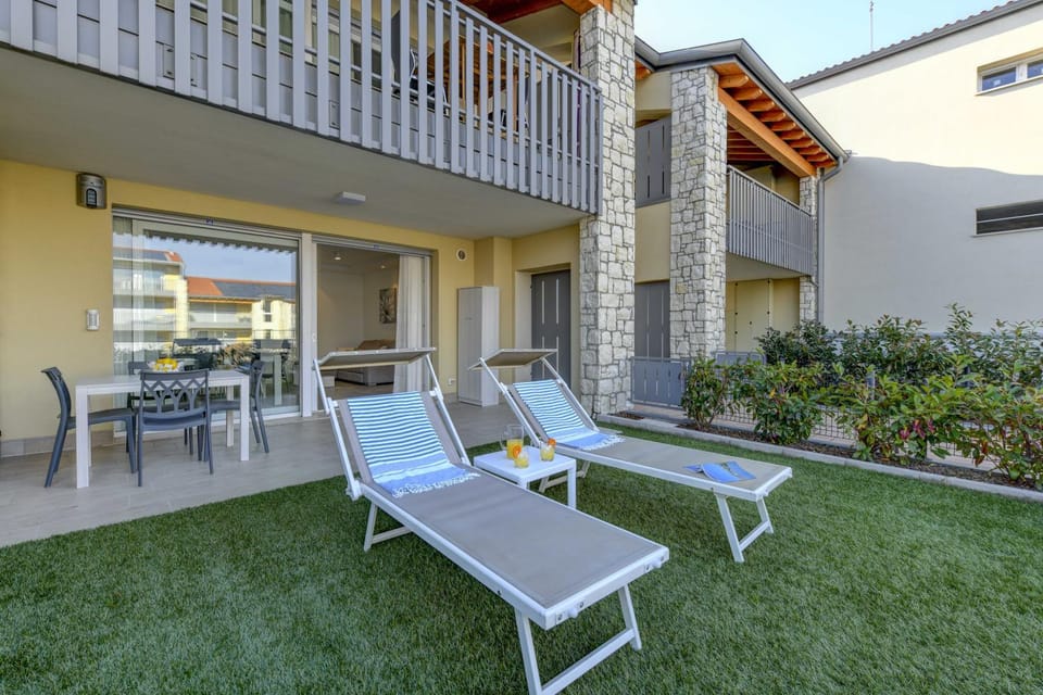 Property building, Patio, Garden, Pool view, sunbed