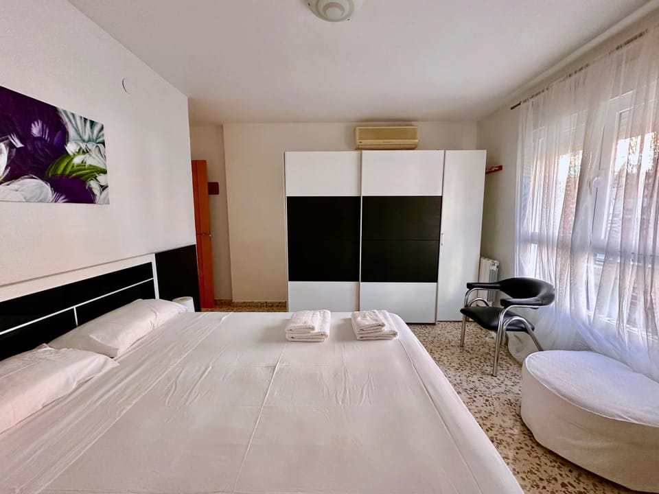 Bed, Photo of the whole room, Bedroom, towels, air conditioner