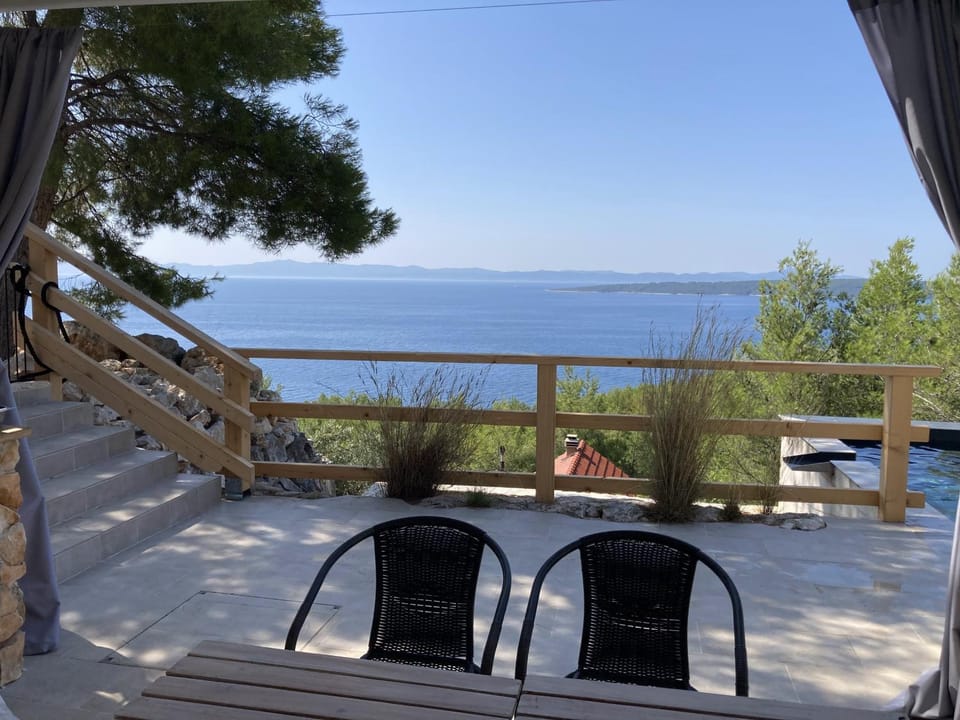 Patio, Natural landscape, Balcony/Terrace, Seating area, Dining area, Sea view, Swimming pool
