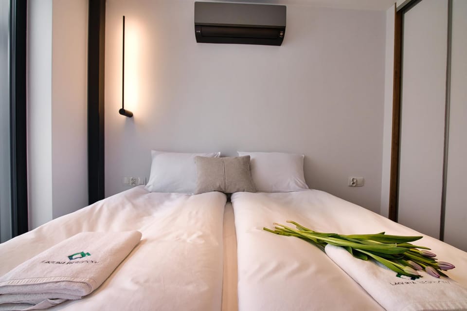 Bed, Photo of the whole room, Bedroom, towels, air conditioner