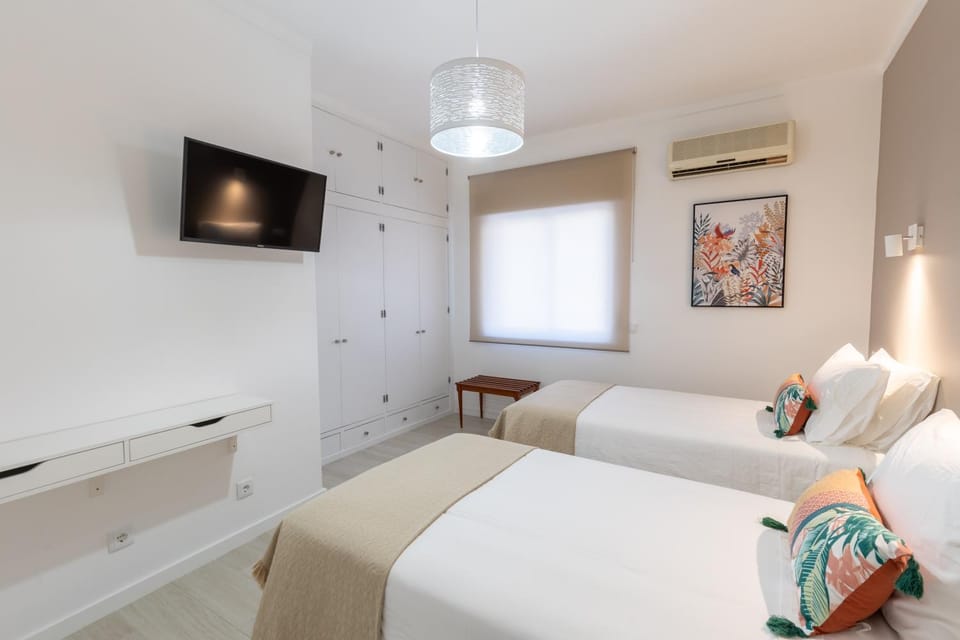 Bed, TV and multimedia, wardrobe, air conditioner