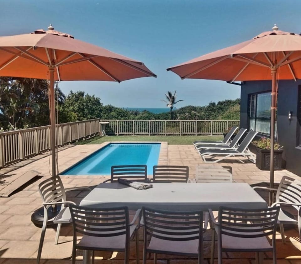 Patio, Pool view, Sea view, Swimming pool, sunbed