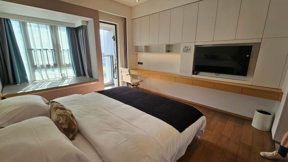 Rho Hotel柔居Shenzhen World Exhibition and Convention Center Qianhai Snow World Apartment hotel in Shenzhen