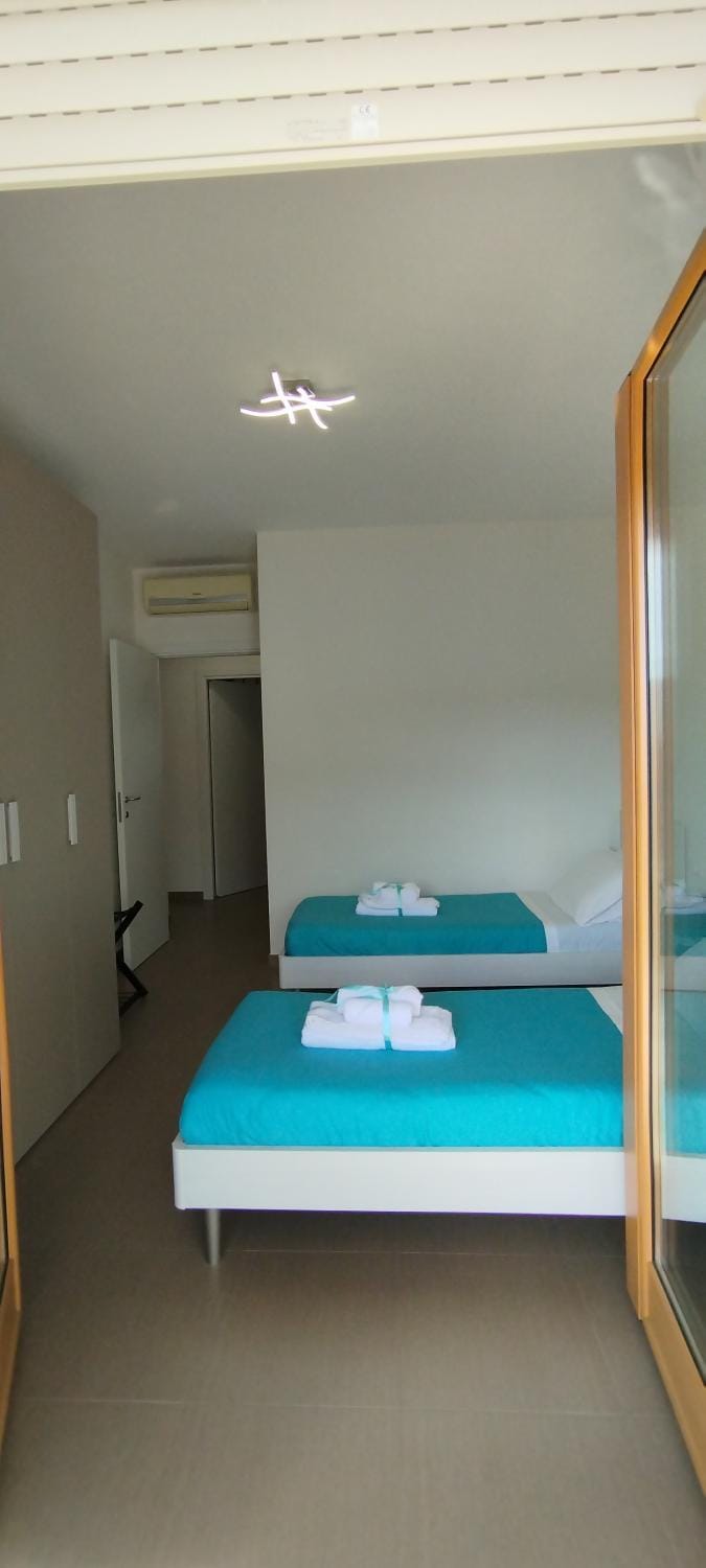 Bed, Photo of the whole room, Bedroom, towels, wardrobe