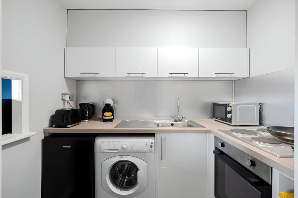Coffee/tea facilities, Kitchen or kitchenette, On site, microwave, stove, toaster, washing machine, washing machine, kitchen