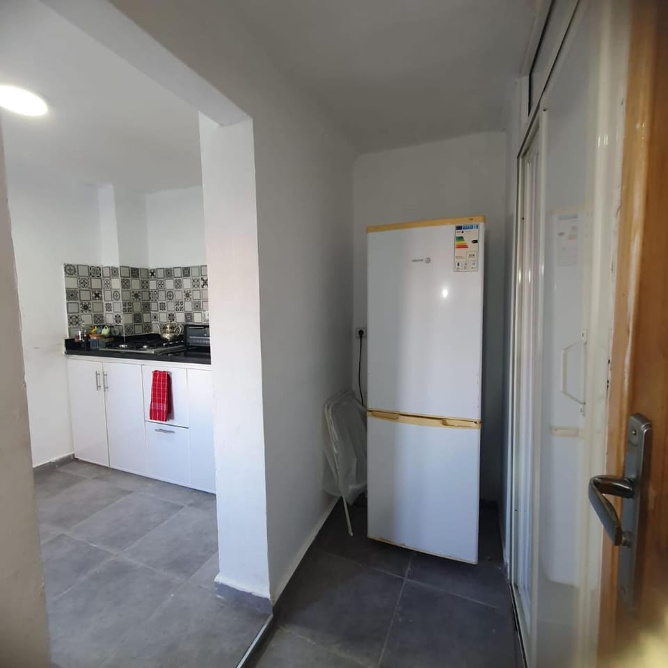 Kitchen or kitchenette, oven