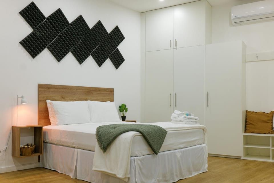 Bed, Photo of the whole room, Bedroom, towels, air conditioner