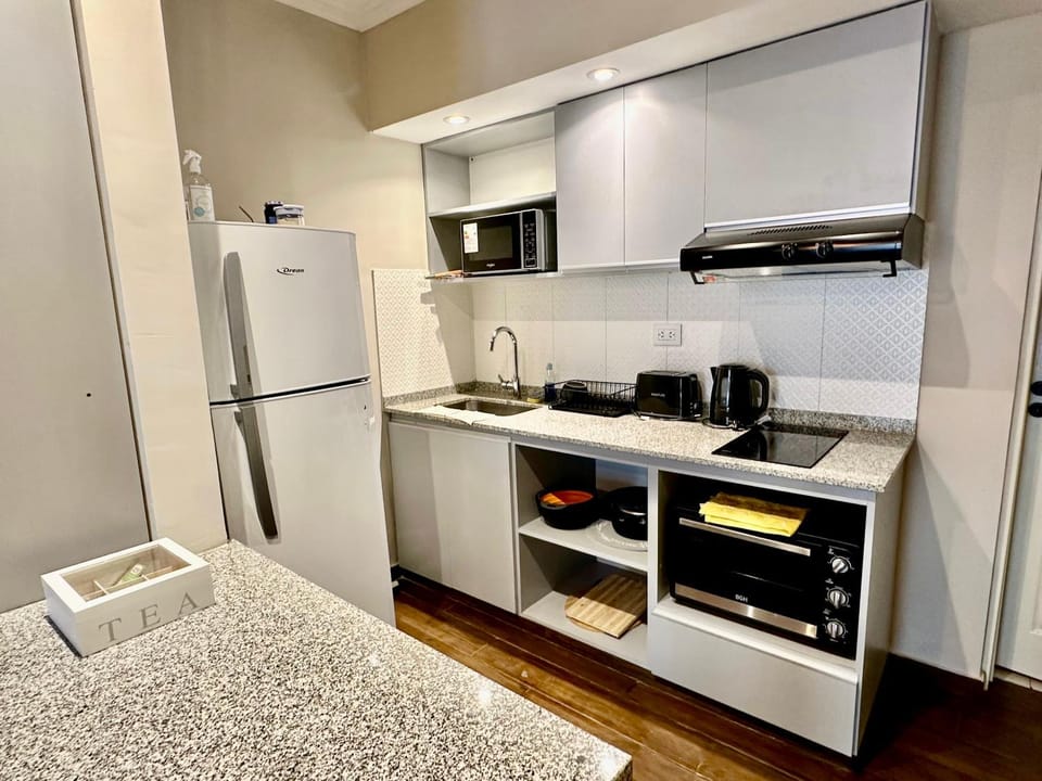 Kitchen or kitchenette, oven, stove, toaster