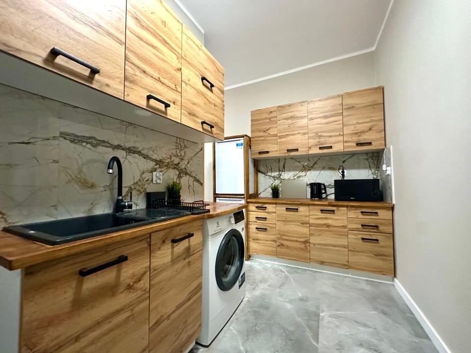 Coffee/tea facilities, Kitchen or kitchenette, minibar, stove, washing machine