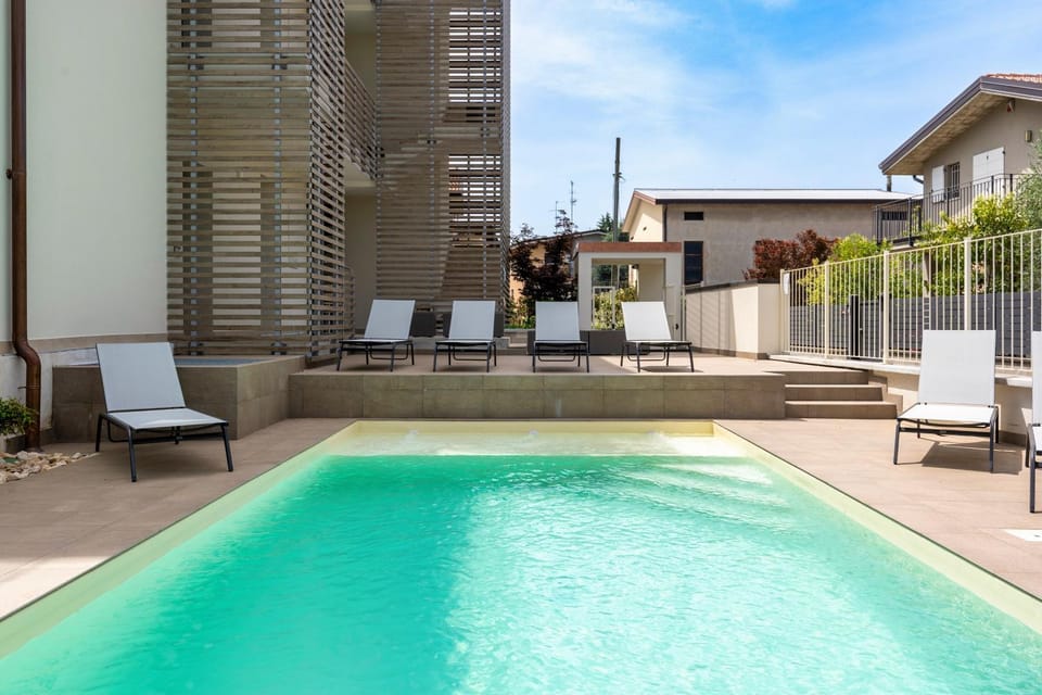 Property building, Pool view, Swimming pool, sunbed
