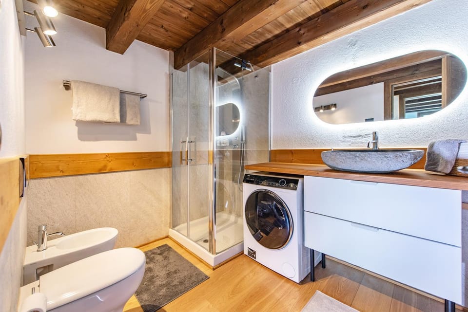 Shower, Toilet, Bathroom, towels, washing machine, dryer