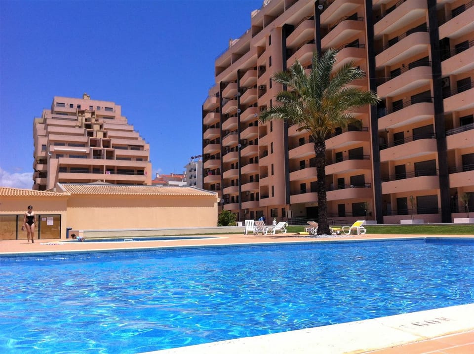 Swimming pool, sunbed